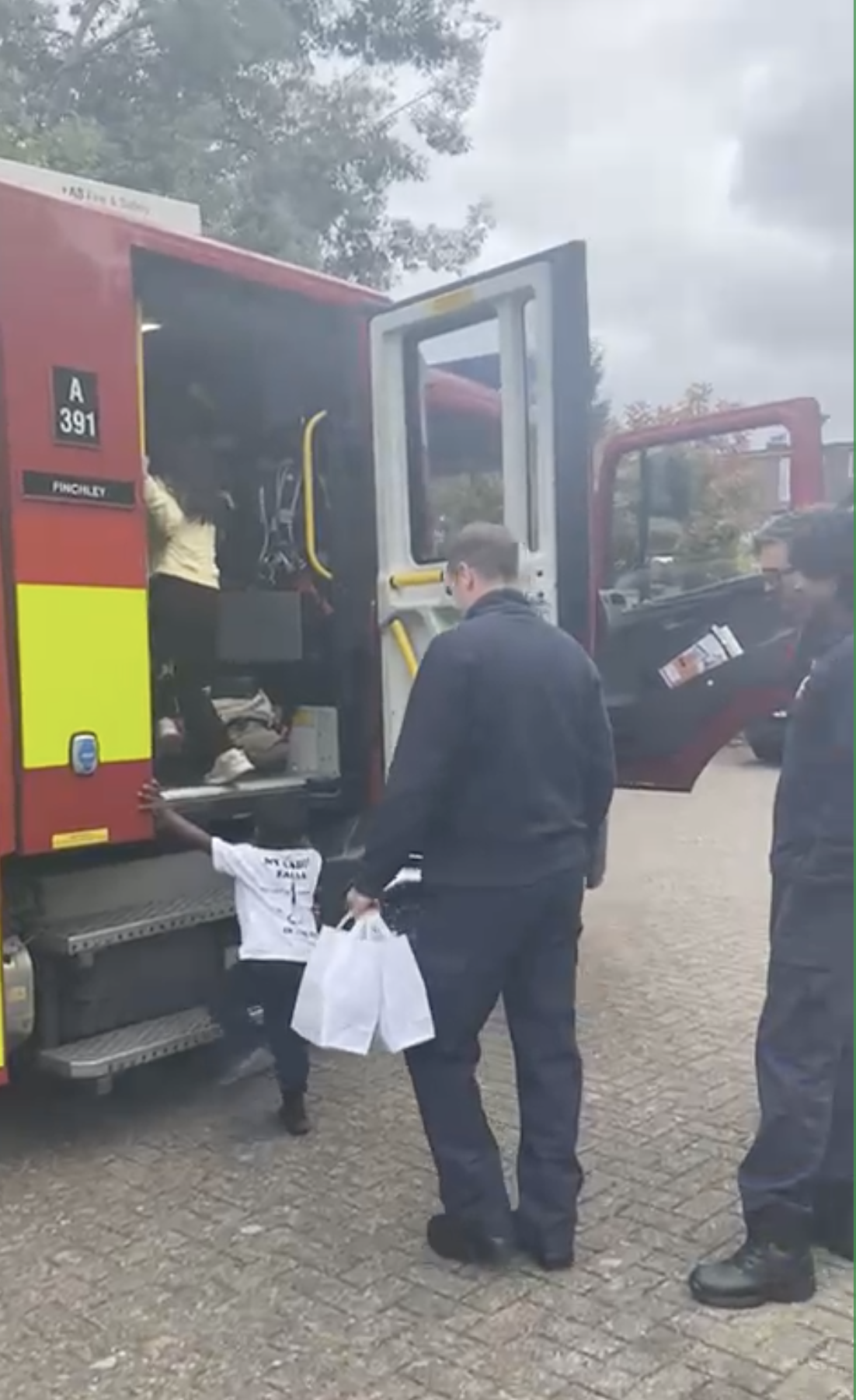 Fire Fighters at the Caribbean food stall! 
